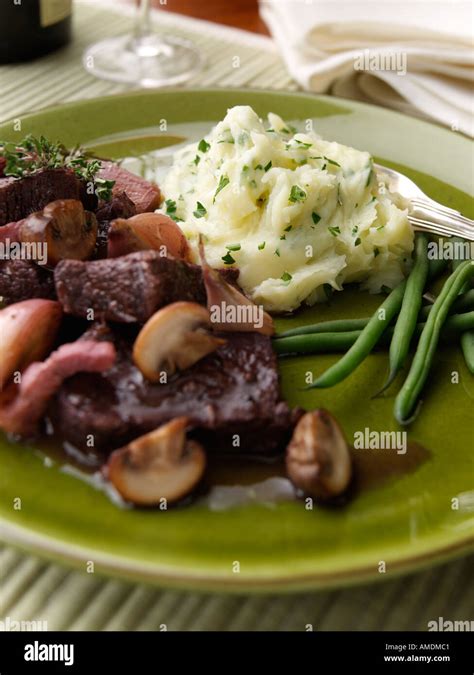 Boeuf Bourguignonne Mashed Potatoes Green Beans Hi Res Stock