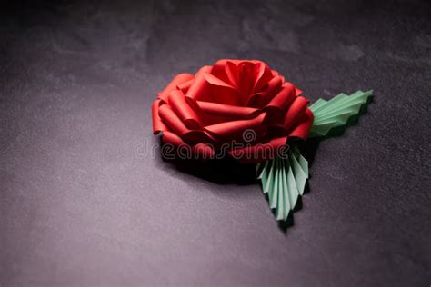 Red Origami Rose Blossom - Paper Art on Textured Background Stock Image ...