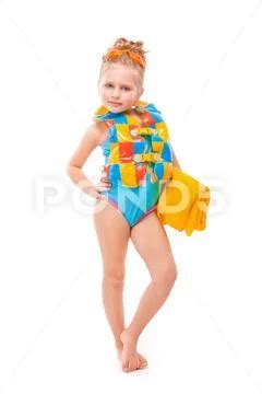 Pretty cute little girl in in blue swimming suit and colorful life ...