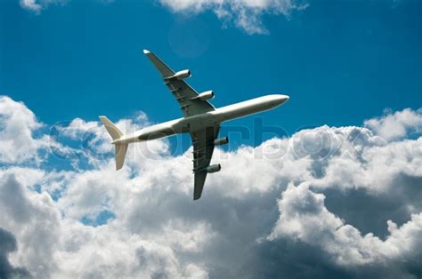 Fly Away With The Plane In Blue Sky Stock Image Colourbox