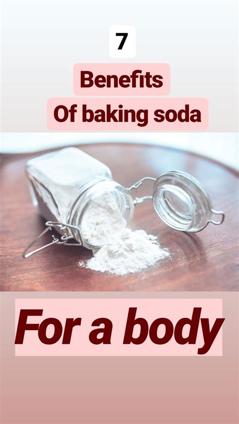 A Wooden Table Topped With White Powder And A Glass Jar Filled With Baking Sodas