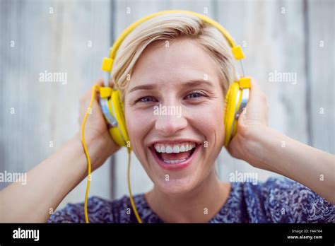 Pretty Blonde Woman Listening Music Stock Photo Alamy