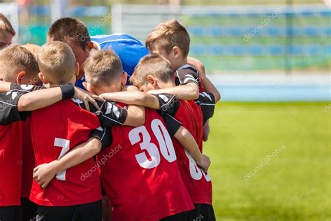 Children sports soccer team. Kids standing together on the football ...