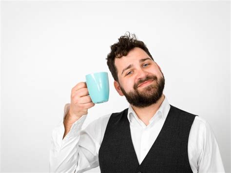 Premium Photo Portrait Of A Man Drinking Glasses Against White Background