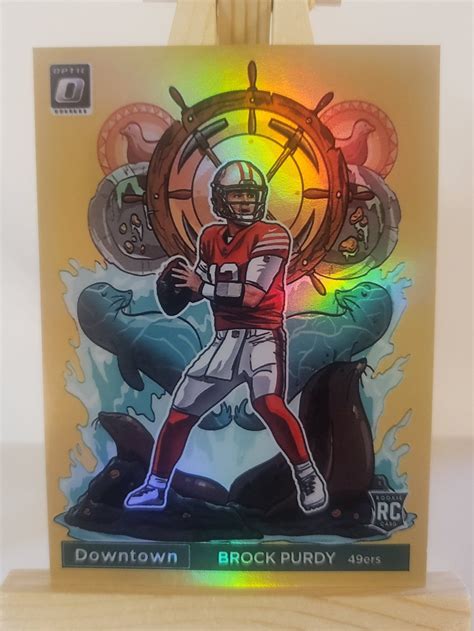 Brock Purdy Donruss Optic Downtown Rookie Novelty Nfl Football