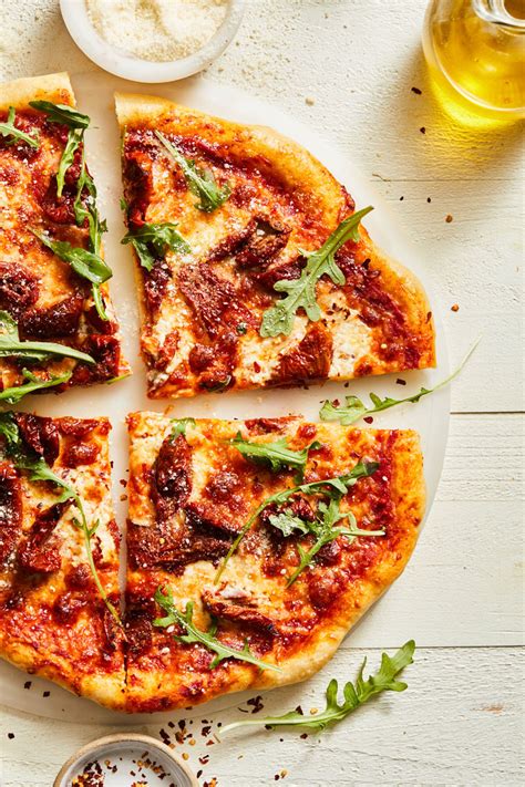 Sun Dried Tomato And Arugula Pizza Delallo