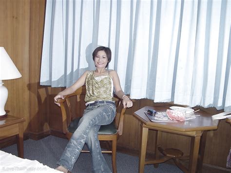 Stunning Asian Babe Stripping And Playing With A Toy On The Bed Porn Pictures XXX Photos Sex