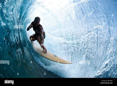 Surfer In The Tube Of Large Wave Stock Photo Alamy