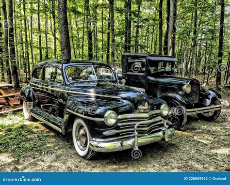 Classic 1946 Plymouth Special Deluxe and a 1929 Ford Model a. Editorial ...