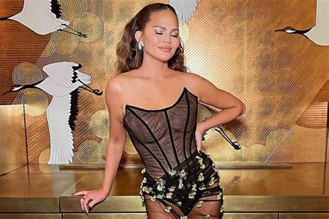 Chrissy Teigen Says Sheer Oscars Party Dress Revealed Her Boob Lift