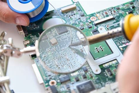 Repairing A Printed Circuit Board With A Soldering Iron Through A