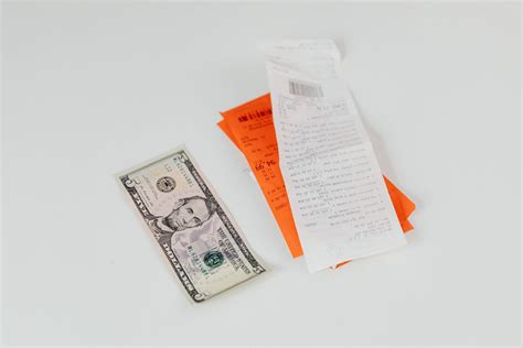 Money Paper and Bills on White Surface · Free Stock Photo