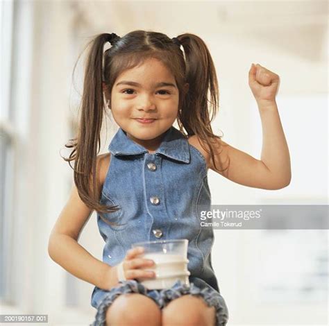 Girl Flexing Muscle Fotografías E Imágenes De Stock Getty Images