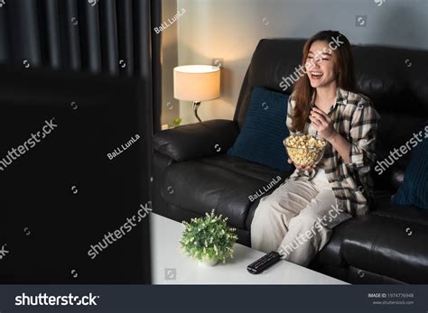 Funny Young Woman Watching Tv Eating Stock Photo 1974776948 | Shutterstock