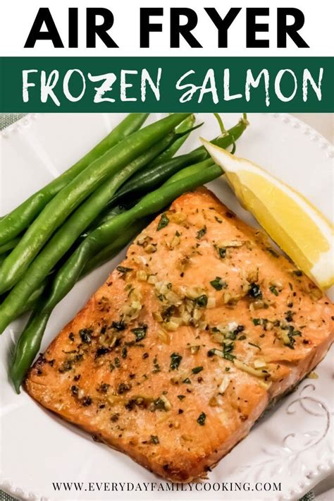 Salmon And Green Beans On A White Plate With The Words Air Fryer Frozen