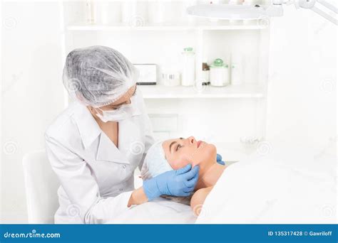 Female Beautician Doctor With Patient In Wellness Center Professional