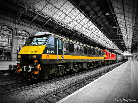 Class 90029 And 90035 With The 4m25 Mossend To Daventry Service At Preston Station Train