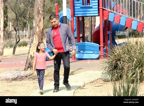 Divorced Single Dad Walks And Runs In The Park With His Year Old Brunette Latina Daughter Who