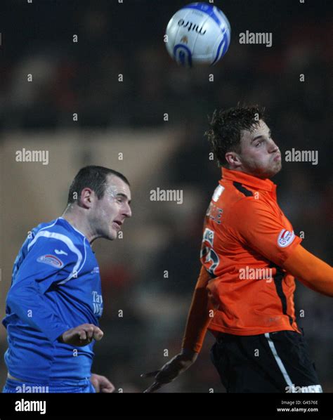 Dundee United's David Goodwillie and St Johnstone's Dave McKay during ...