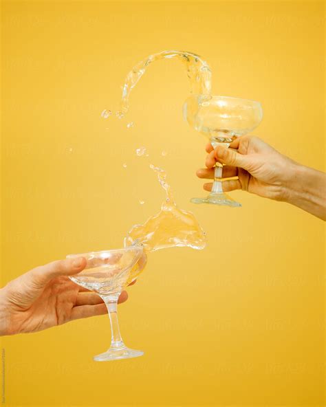 People Splashing Champagne From Glasses By Stocksy Contributor Duet Postscriptum Stocksy