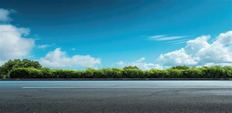 Premium Photo Pristine Asphalt Road Nature Landscape Under Blue Sky