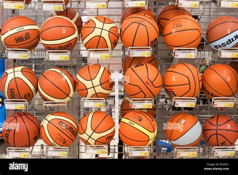 Basketball balls displayed shelves "Decathlon" sportswear company store ...