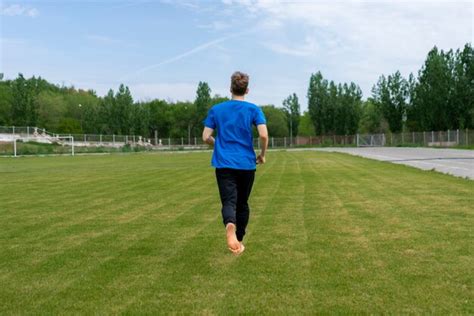 Premium Photo Healthy Morning Running Male Athlete On The Green