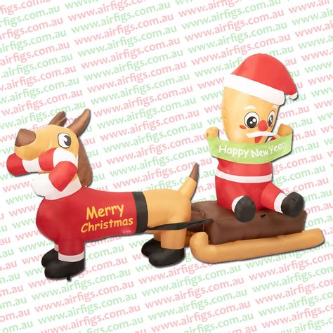 M Pup Pulls A Gingerbread Sleigh Inflatable Airfigs Inflatables