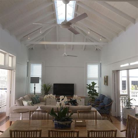 formal living raked ceiling  joist   fan living area