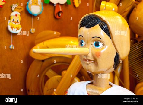 Wooden Pinocchio Doll With Long Nose Stock Photo Alamy