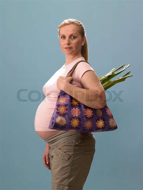 Pregnant Woman Holding Bag Stock Image Colourbox