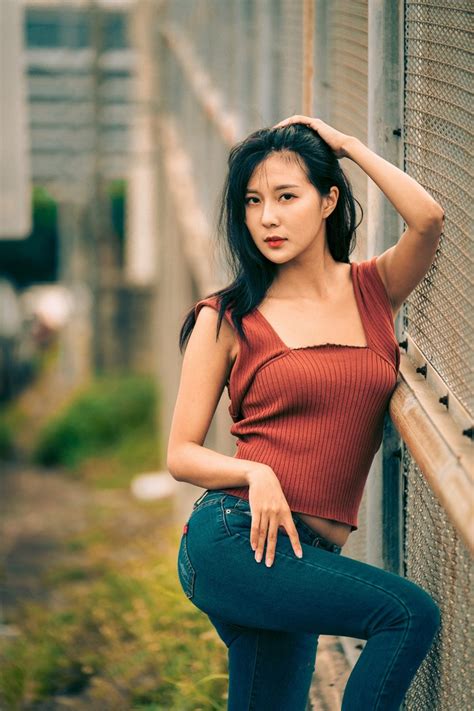 Asian Pose Jeans Hands Brunette Girl Glance Hd Phone Wallpaper