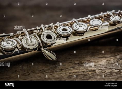 Modern Concert Flute On A Wood Table Stock Photo Alamy