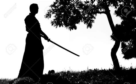 Samurai Silhouette In Front Of Tree Stock Photo Picture And Royalty