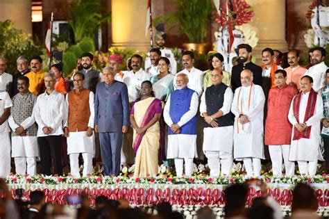 President Droupadi Murmu And Prime Minister Narendra Modi Pose For A Photograph With New Council