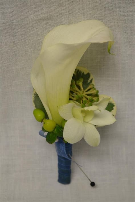 Simple White Calla Lily Boutonniere With Orchids And Hypericum Berries