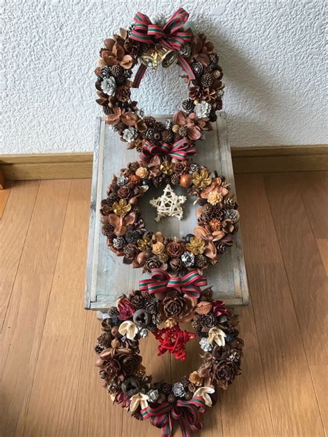 《xmas》北欧の森の木の実とリボンの三連リース 53cm（再販x2＊残すところ1点のみ） リース Burosye 通販｜creema