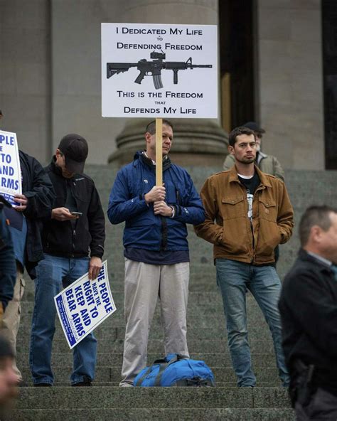 Gun Advocates Exercise Rights On Capitol Steps