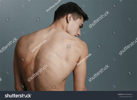 Sexy Man Naked Back Looks Side Stock Photo 1883808853 Shutterstock