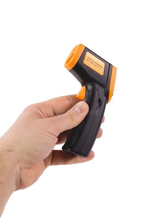 A Man Holds A Yellow Black Pyrometer A Device For Non Contact