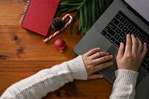 Premium Photo Top View A Female Typing On Keyboard Using Laptop At