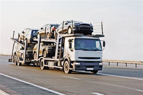 Car Carrier Truck Deliver New Auto Batch To Dealer Royalty Free Stock