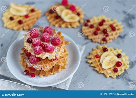 Traditional Belgian Waffles With Fresh Fruits Sprinkled With Powdered