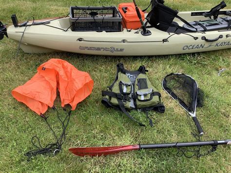 Ocean Kayak Trident Fishing Kayak With C Tug Trolley Carbon Paddle