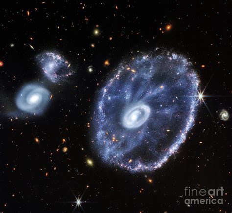 Cartwheel Galaxy And Companion Galaxies By Nasa Science Photo Library