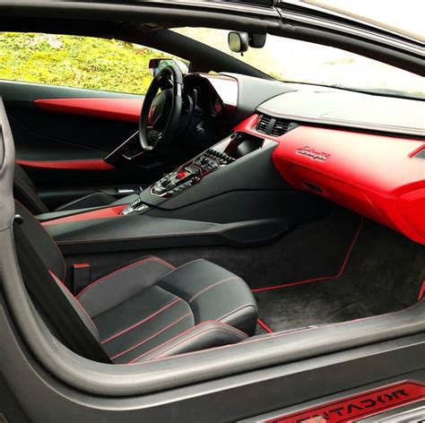 Interior of the Lamborghini Aventador S Roadster pained in Nero Granatus w/ Dark Red accents ...