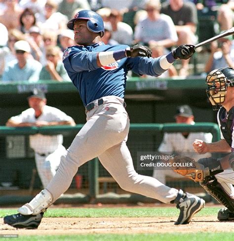 Sammy Sosa Of The Chicago Cubs Follows Through On His Swing 30 August