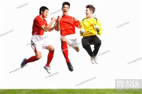 Three football players celebrate your success, Stock Photo, Picture And ...