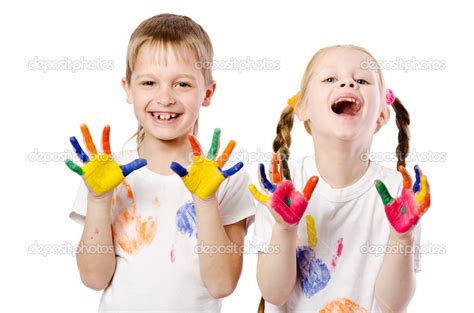 Happy Smiling Children Showing Their Hands Painted In Bright Col