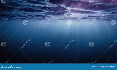 Dark Blue Ocean Surface View From Underwater With The Rays Of Sunlight